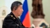 FILE - China's Defense Minister Gen. Li Shangfu speaks to Russian President Vladimir Putin and Defense Minister Sergei Shoigu during talks at the Kremlin in Moscow, April 16, 2023.