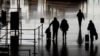People walk in the departures hall at Beijing Capital International Airport after China lifted the COVID-19 quarantine requirement for inbound travelers, Jan. 8, 2023.