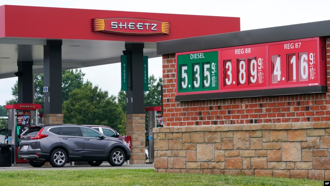 Gas prices are displayed at a station, July 7, 2022, in Sandston, Virginia. Gas prices in much of the United States passed $5 a gallon last month before a slight drop.