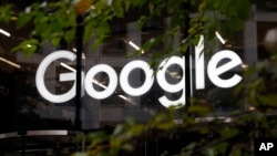 FILE - The Google logo is seen at Google offices in Granary Square, London, Nov. 1, 2018. 