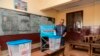 FILE - The Governor of the Central Region of Cameroon, Paul Naseri Bea, casts his ballot in the general and municipal elections in Yaounde, Feb. 9, 2020. 