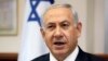 FILE - Israeli Prime Minister Benjamin Netanyahu chairs the weekly cabinet meeting in his office in Jerusalem.