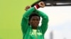 FILE - Ethiopian distance runner Feyisa Lilesa made headlines when he crossed his wrists above his head, a symbol that has become the rallying cry for protests in the Oromia region of Ethiopia.