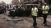 Emergency personnel inspect damage after a bomb attack targets Egypt's prosecutor general in the Heliopolis district of Cairo, June 29, 2015. 