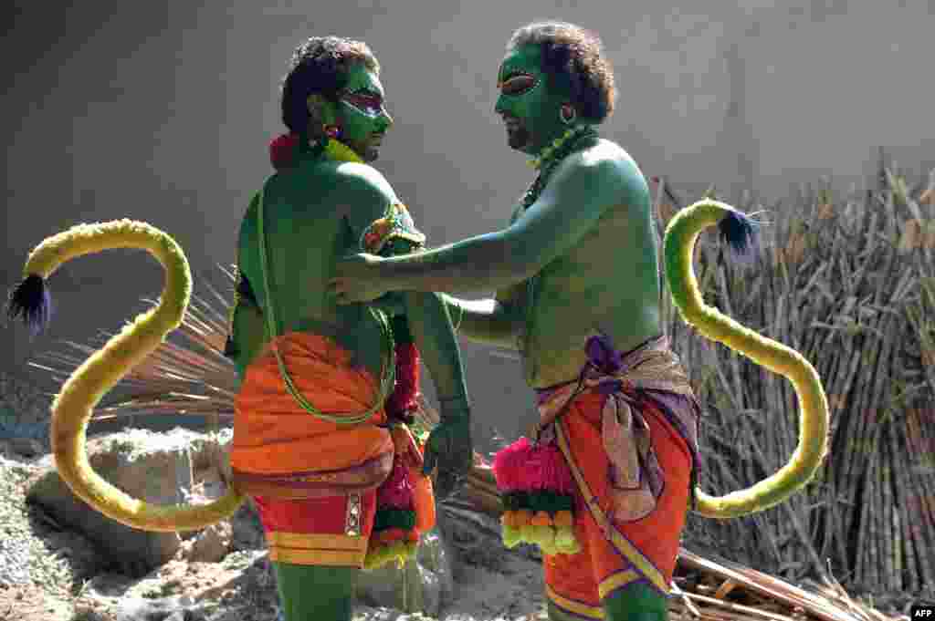 Indian artists dress up as the Hindu deity &quot;Hanuman&quot; -- the monkey God in Hindu mythology -- to mark the Rama Navami festival in Bangalore.